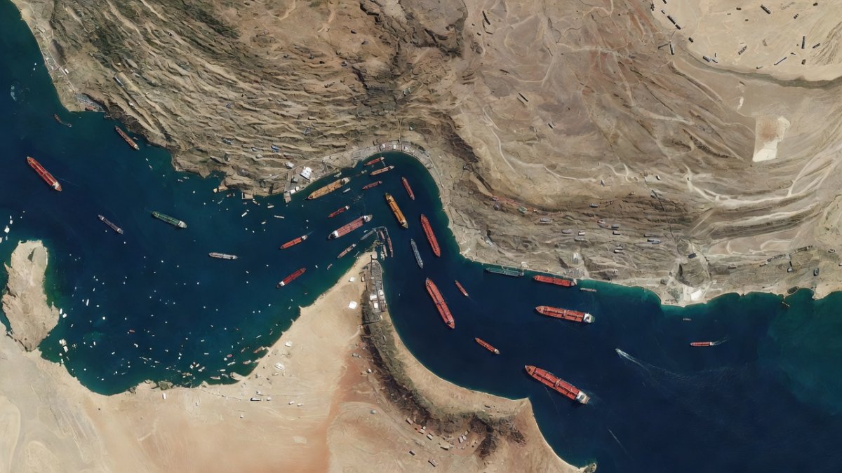 Satellite view of the Strait of Hormuz, a critical maritime chokepoint connecting the Persian Gulf to the Gulf of Oman