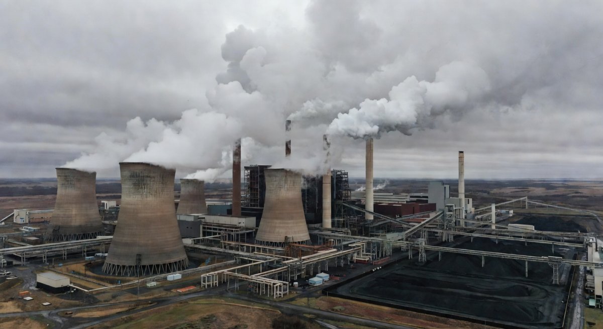 Aerial view of coal-fired power plant with cooling towers