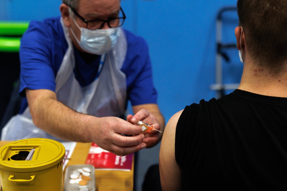 Students queue to receive the meningitis B vaccine at the University of Kent during the outbreak