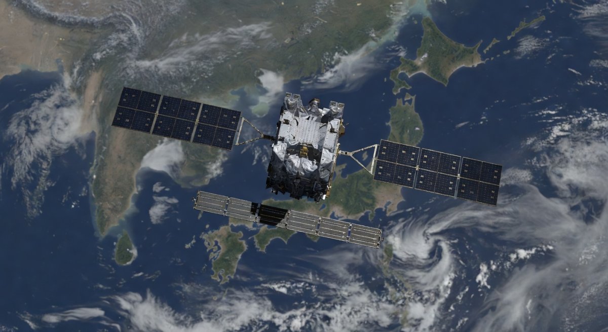 Japanese Earth observation satellite in orbit above the Asia Pacific region with SAR antenna deployed