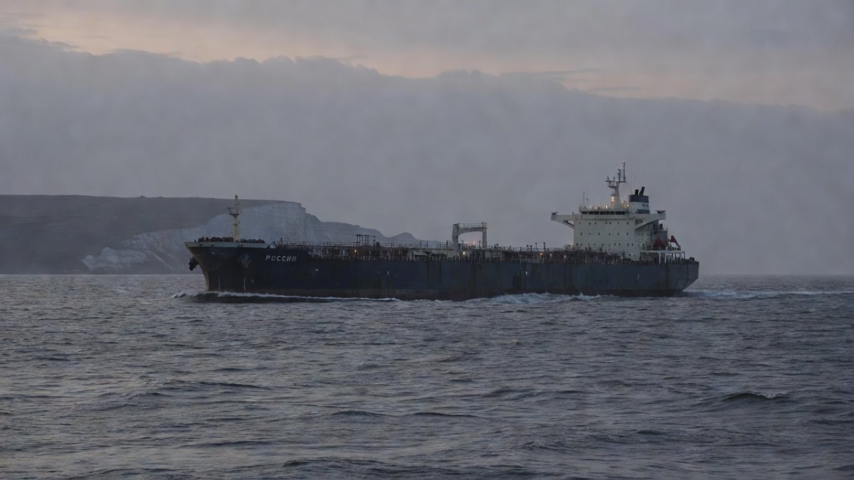 Russian tanker navigating English Channel at dusk