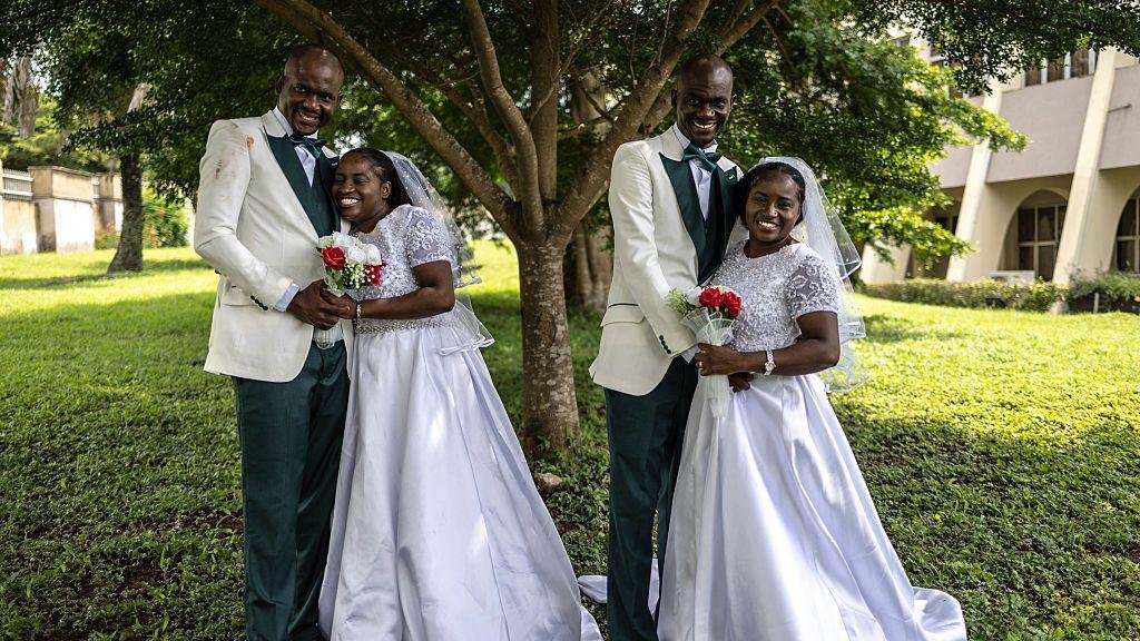 Guests and twin couples at the Nigerian joint wedding ceremony