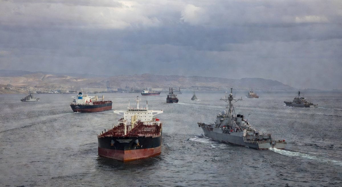 Strait of Hormuz with oil tankers and naval vessels during the Iran crisis