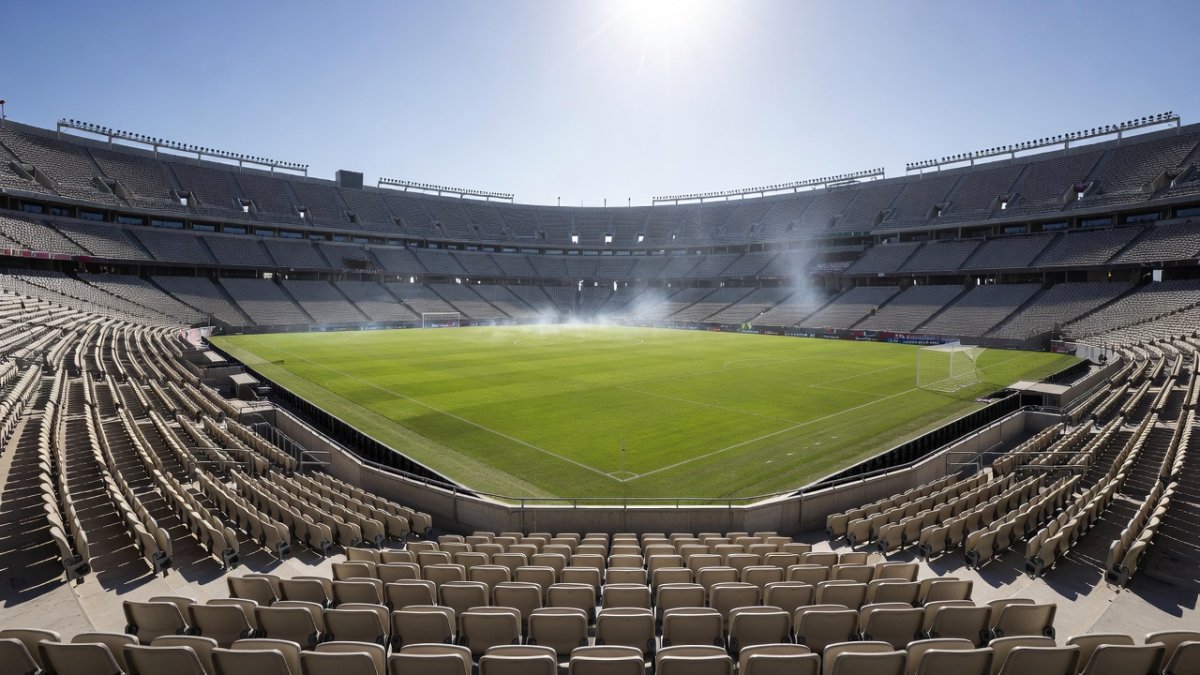 Football stadium under blazing sun with heat haze, representing climate risks at World Cup 2026