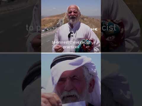 Palestinian protesters at Jabal Tarusa hillside in the occupied West Bank