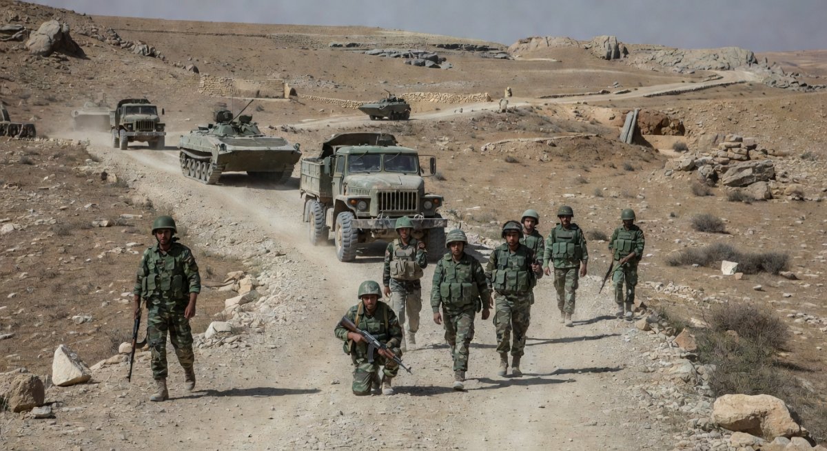 Syrian military forces patrolling the Syria-Lebanon border region near Qusayr