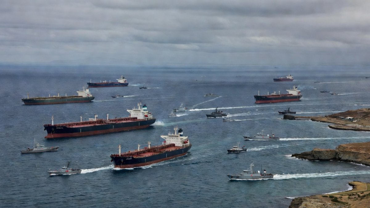 Aerial view of the Persian Gulf with naval vessels near the Strait of Hormuz during the US-Iran ceasefire