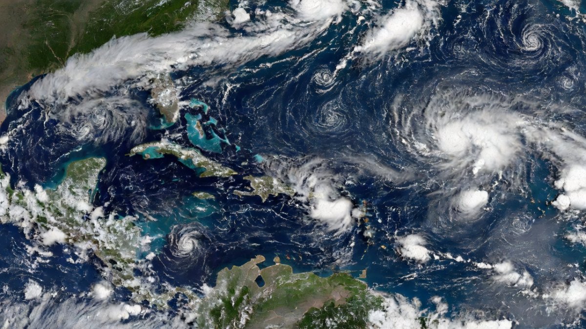 Satellite view of the Atlantic Ocean with developing tropical cloud systems across the eastern Atlantic and Caribbean basin