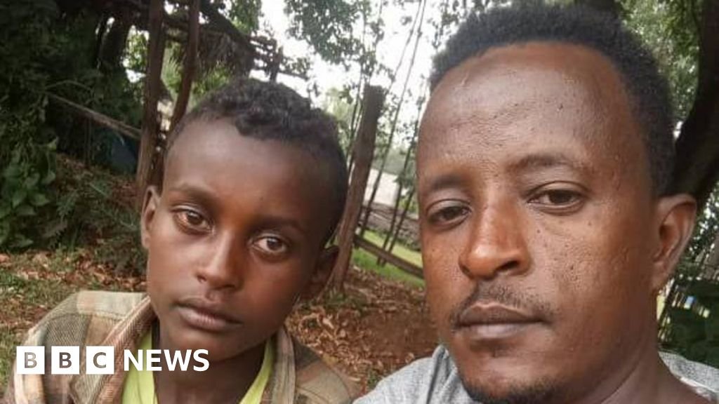 Nurse Umer Chane and Markos Abaye pose for a selfie