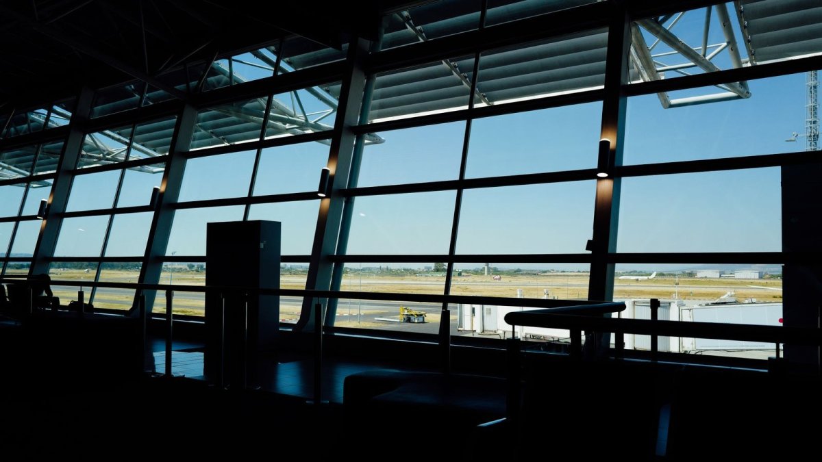 Airport terminal and runway — Dulles International Airport serves a record 29 million passengers a year