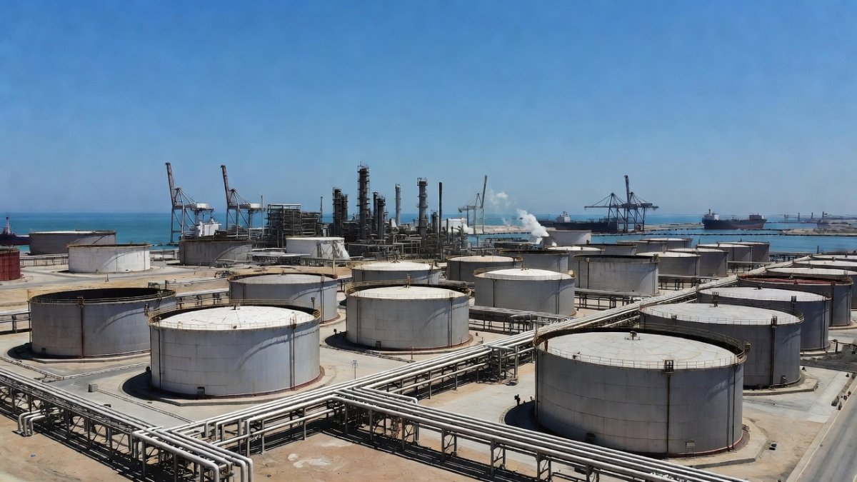 Oil storage tanks and refinery facilities at a Middle Eastern port