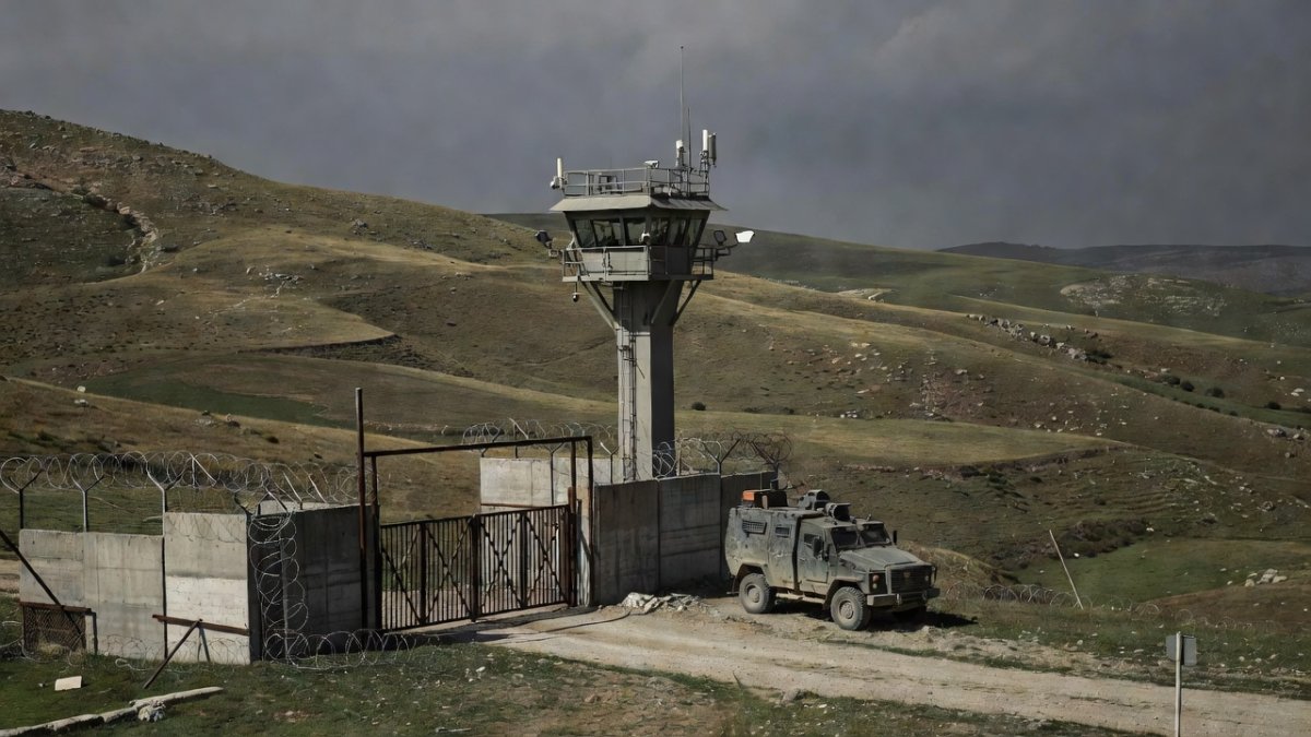 Israeli military gate and surveillance tower in rural southern Syria near the Golan Heights