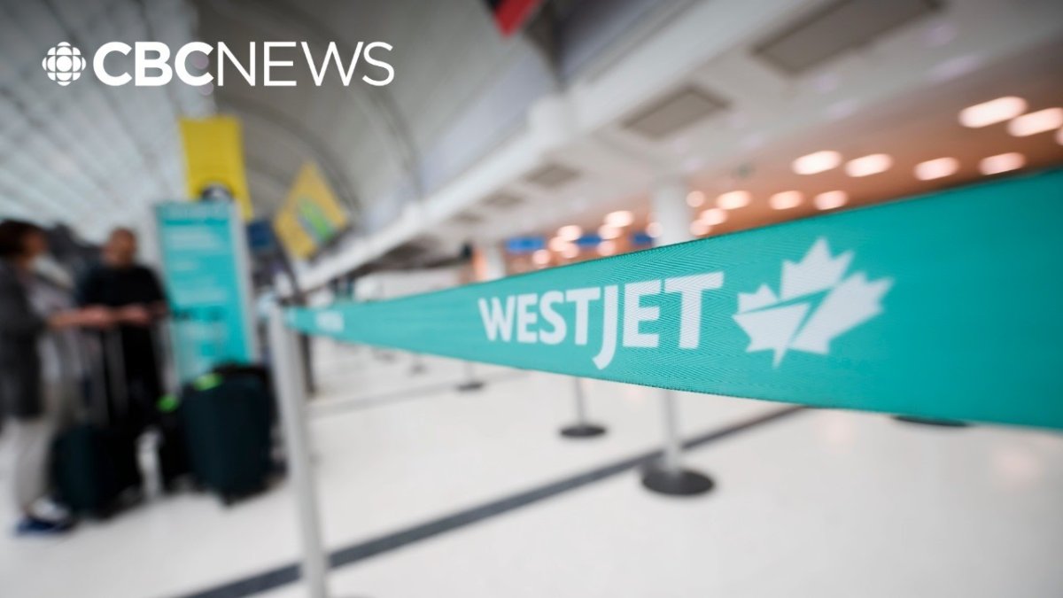 Airline passengers waiting at airport terminal