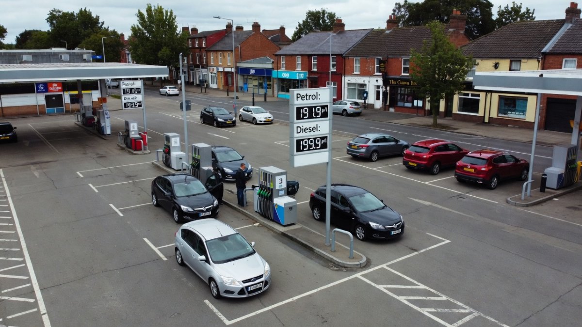 UK petrol station forecourt showing fuel prices