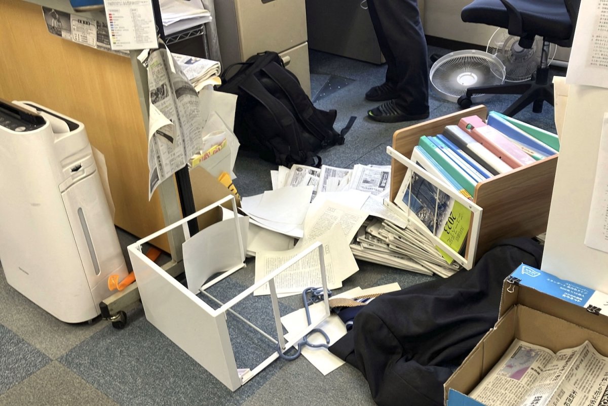 Toppled shelving inside a store after the 7.1 magnitude earthquake struck Kumamoto Prefecture