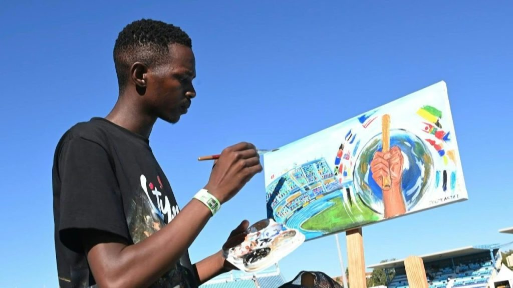 Artists in Botswana Capture World Athletics Relays Through Live Painting