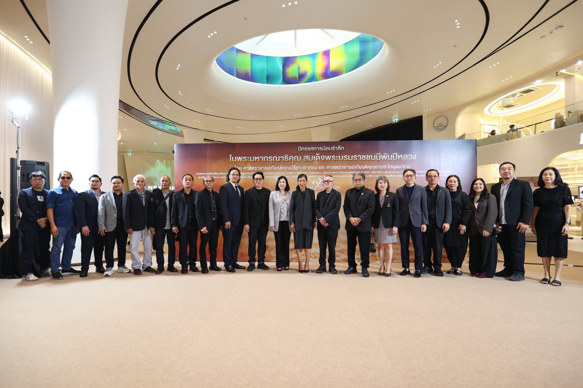 Thai artists and visitors at the Queen Sirikit tribute exhibition featuring works by National Artists in Bangkok