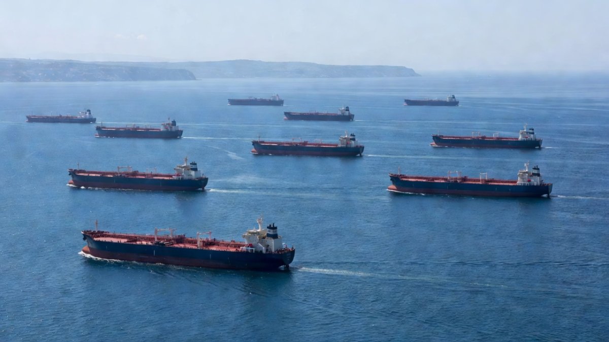 Wide aerial view of oil tankers in the Strait of Hormuz, a key maritime chokepoint for global energy