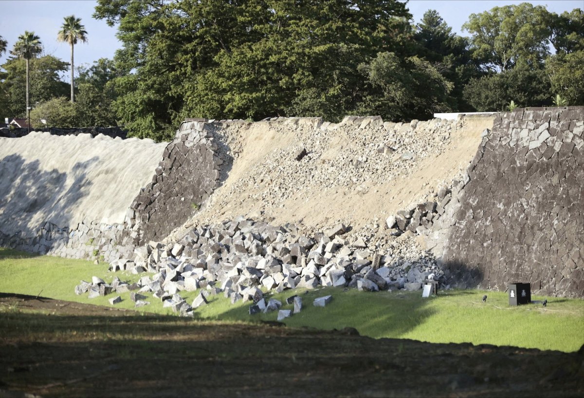 Partially collapsed stone wall at Kumamoto Castle, a centuries-old landmark damaged by the earthquake