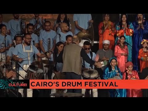Cultural performers showcasing traditional arts at the Cairo drum festival