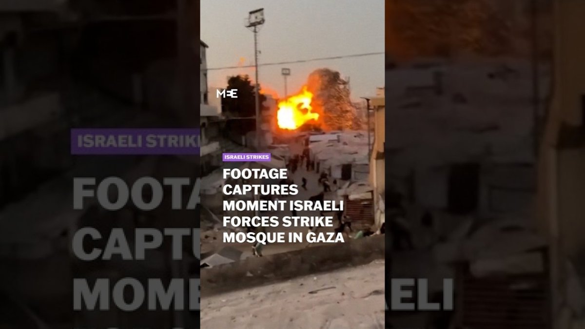 Displaced Palestinians near destroyed tents