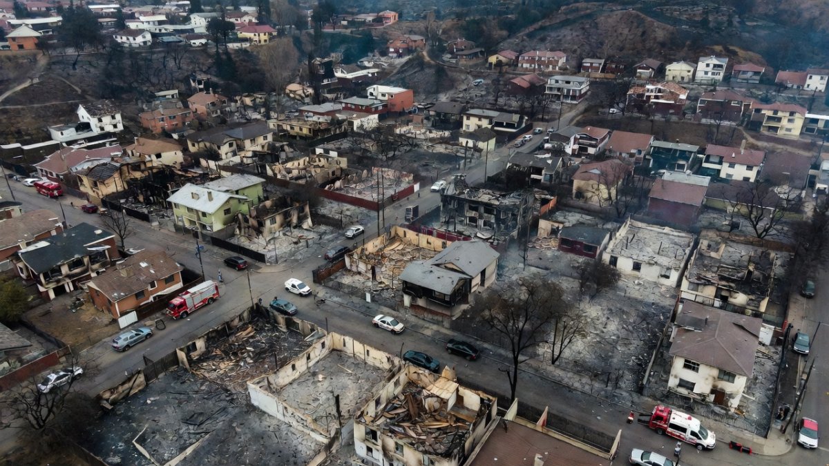 Destroyed homes and burned landscape in Penco, Concepcion Province, Chile after the January 2026 wildfires