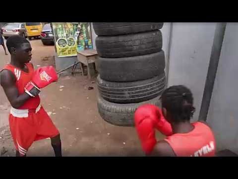 Nigerian youth boxers training on the streets of Lagos, Nigeria