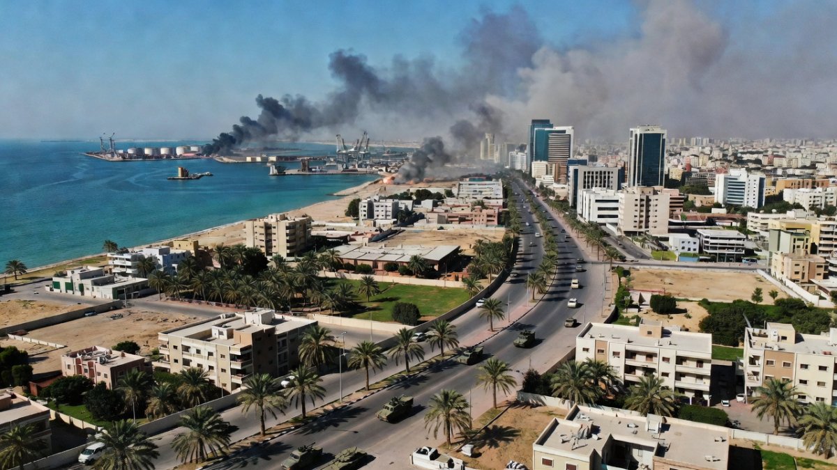Gulf port city with smoke rising after Iranian strikes