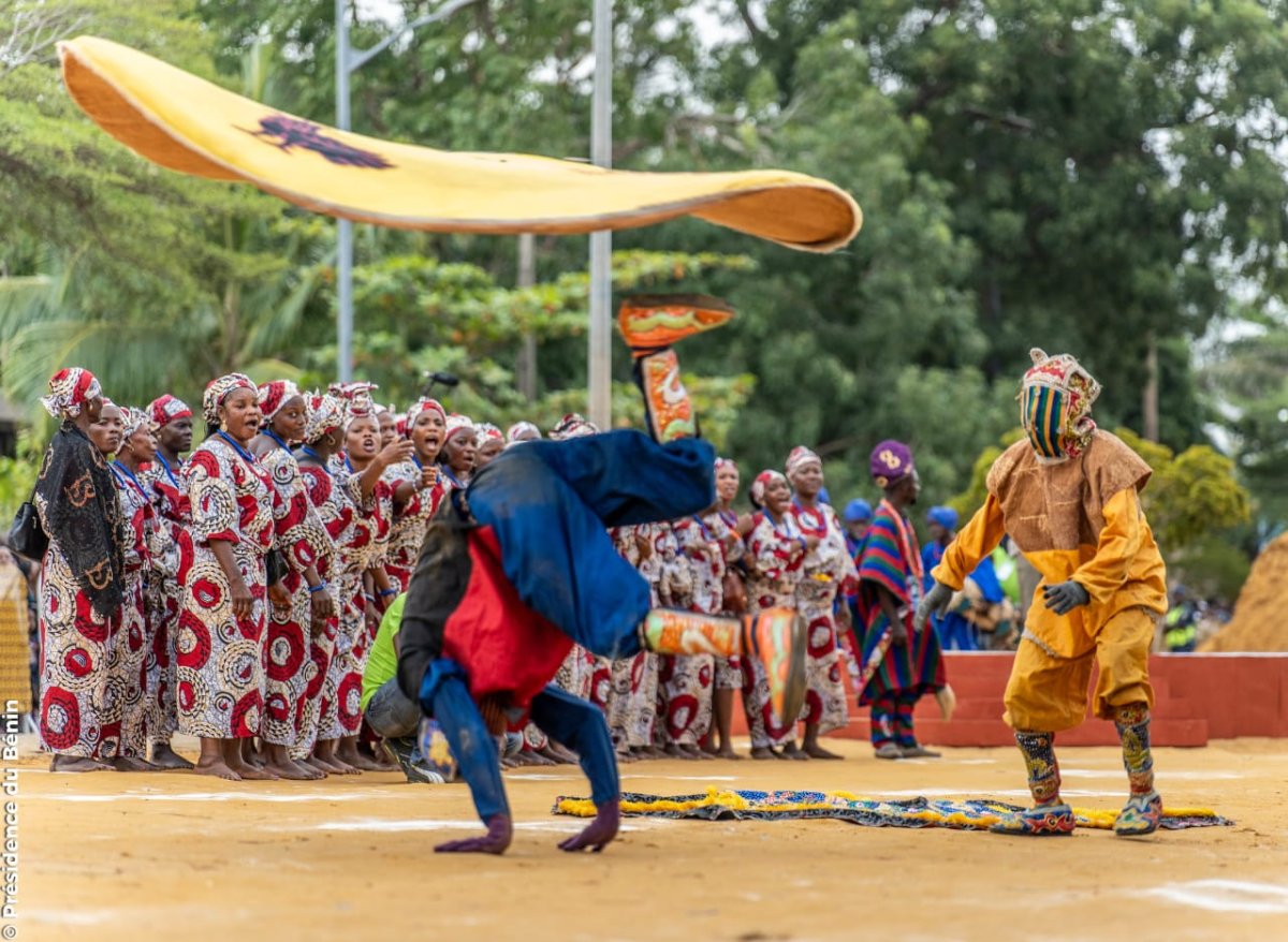 Grand procession of sacred masks at the Festival des Masques in Porto-Novo, Benin, featuring traditional Vodun and Yoruba masquerades