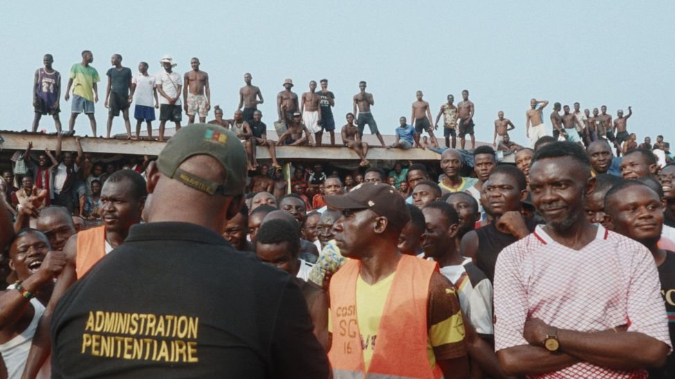 Prisoners gather in the courtyard of New Bell prison in Douala, Cameroon