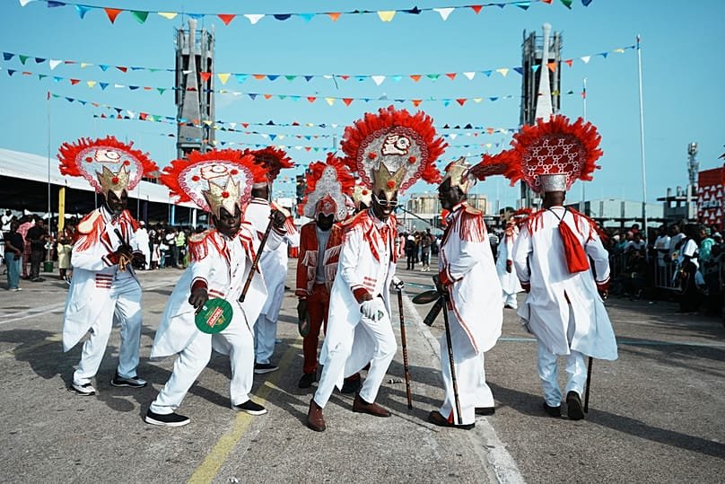 Colourful Fanti Carnival parade with traditional Afro-Brazilian costumes and samba dancers in Lagos