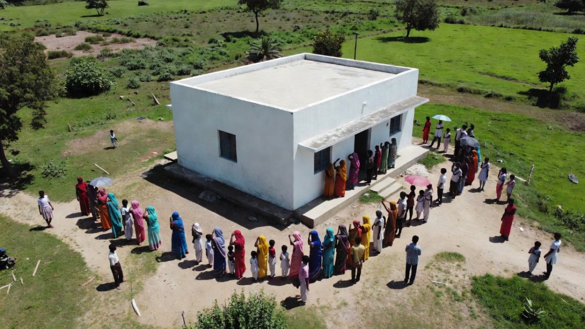 Women and girls at a community health centre in rural India ahead of HPV vaccination session