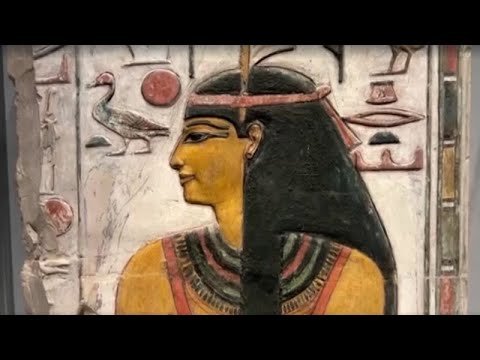 Ancient Egyptian artifact from the Divine Egypt exhibition featuring a scarab beetle sculpture representing Khepri god of the morning sun