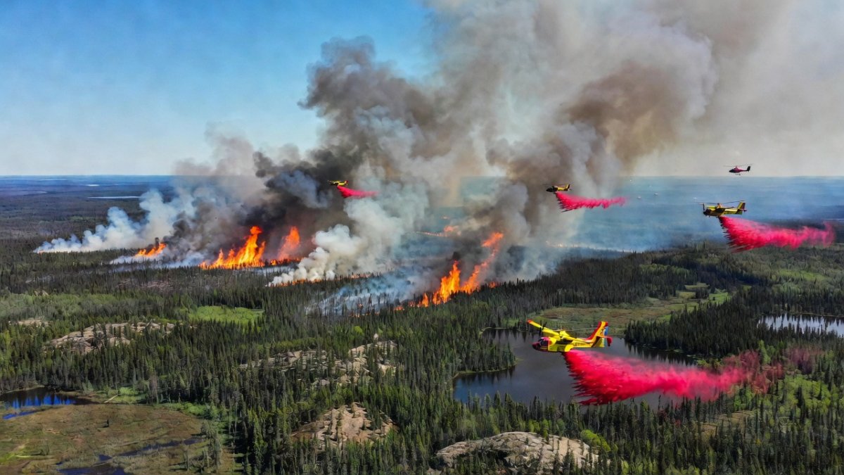 Towering flames visible from a wildfire near Ontario communities
