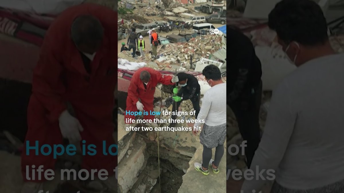 Rescue workers search through rubble in La Guaira, Venezuela after twin earthquakes