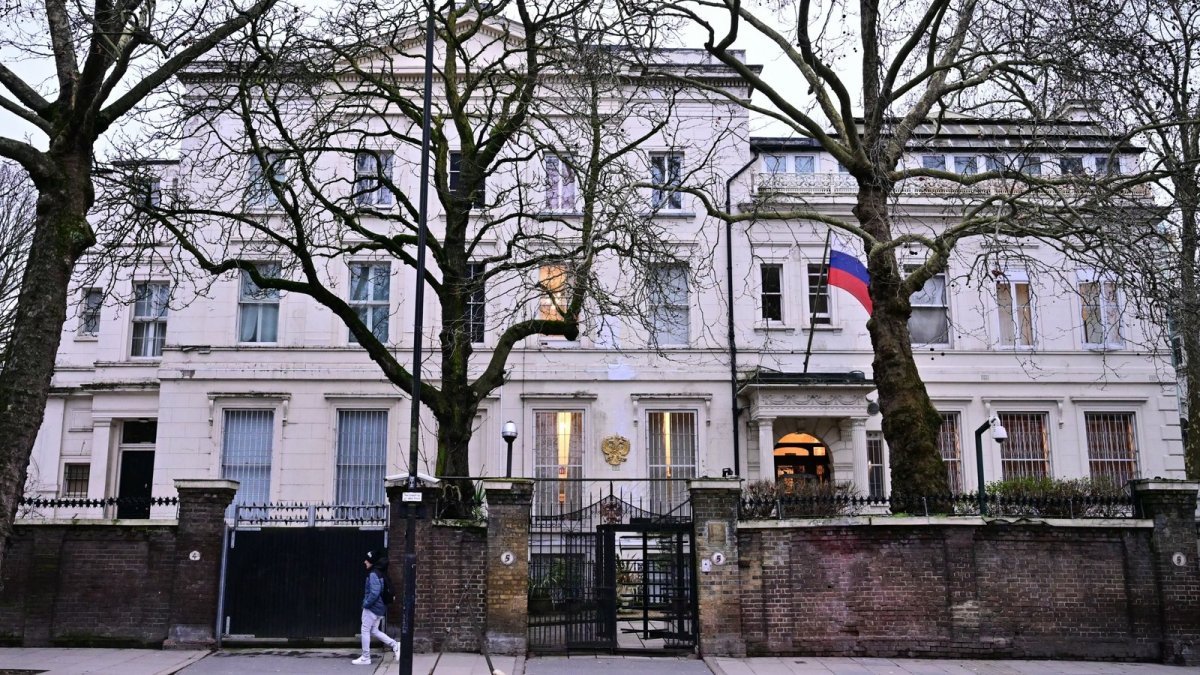 The Russian flag hangs outside the Russian embassy in London