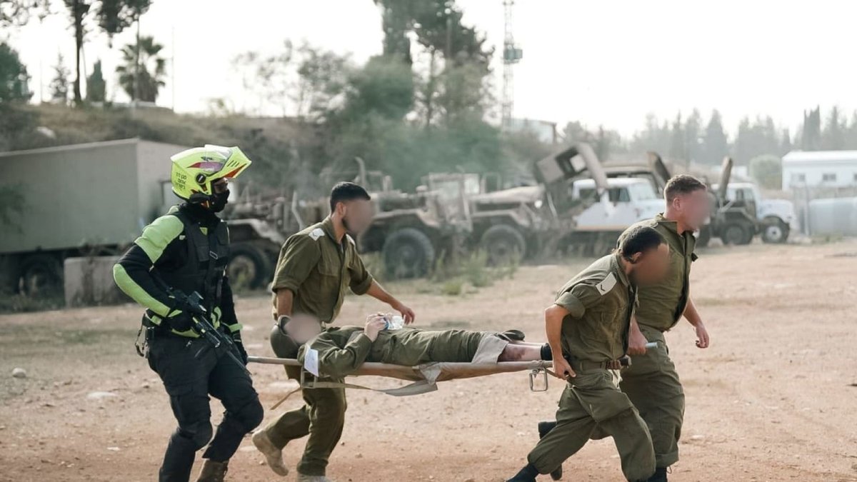 Jordanian border security fence and IDF patrol