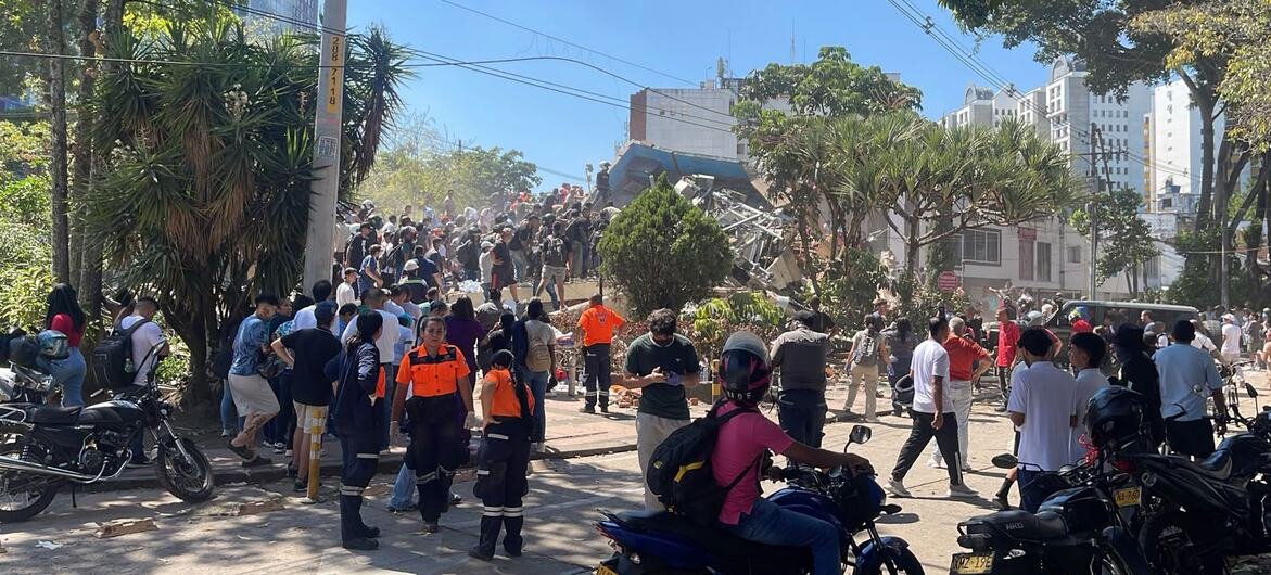 Emergency responders at the site of a collapsed building in Cali, Colombia