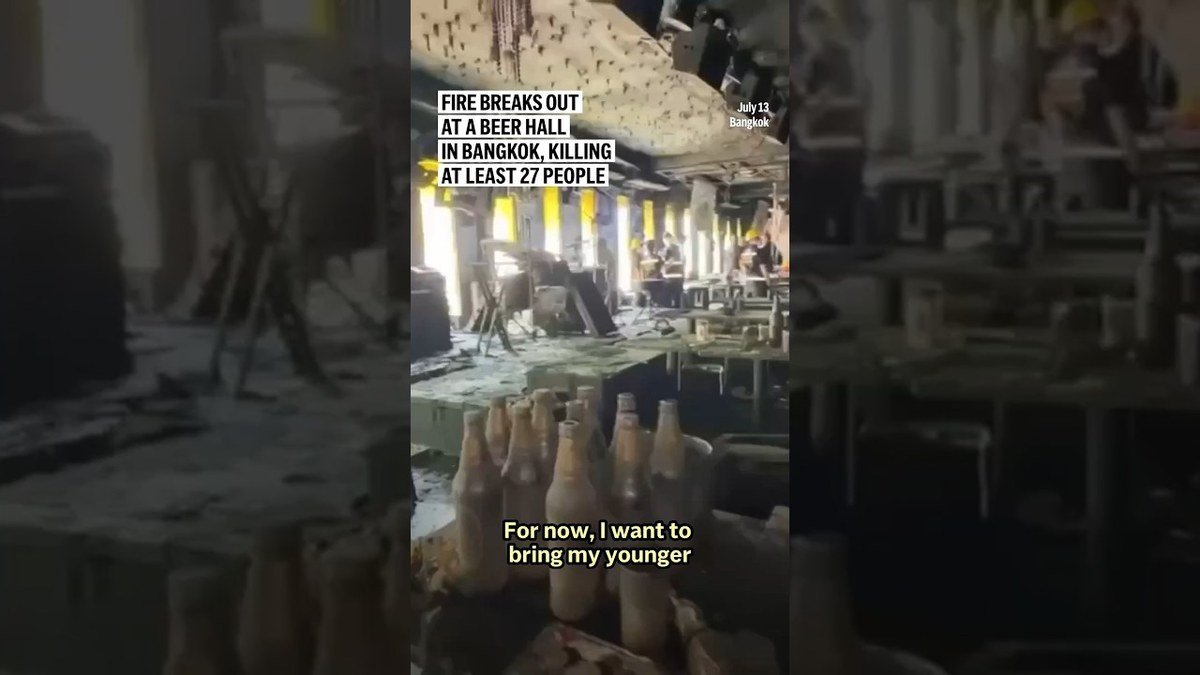 Emergency crews respond to the deadly fire at the Na Ladprao beer hall in Bangkok