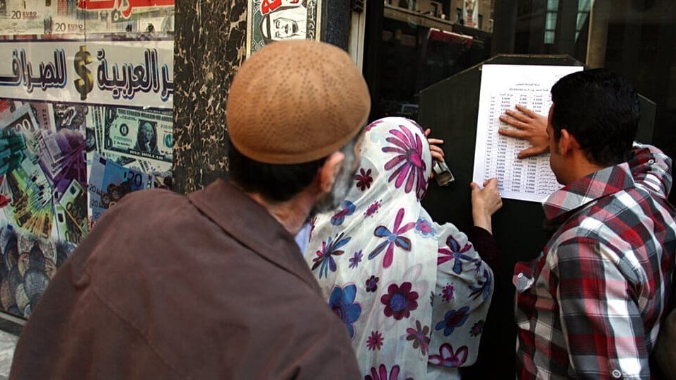 Currency exchange office in downtown Cairo displaying Egyptian pound rates