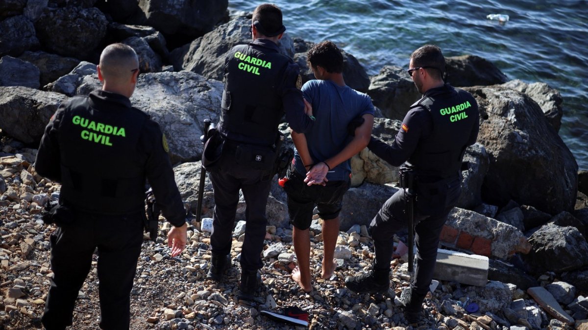 Migrants in Ceuta after mass crossings from Morocco, August 2026