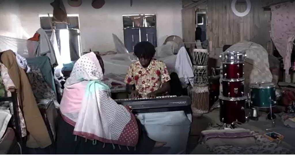 Creative work continues in the courtyard of the El-Rabat shelter as displaced Sudanese artists rebuild cultural life