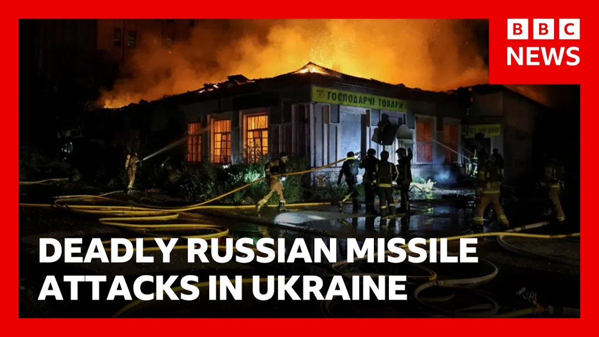 Firefighters at the site of a missile strike on residential buildings in Kyiv
