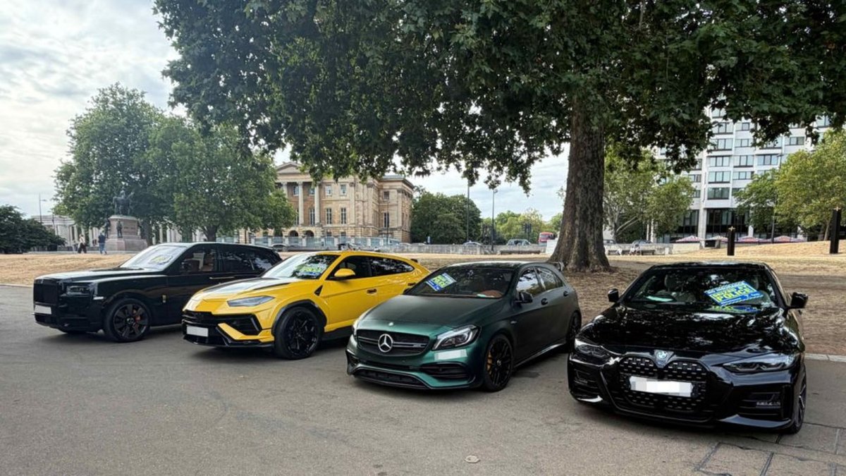 A Lamborghini supercar being loaded onto a police recovery truck near Wellington Arch in London