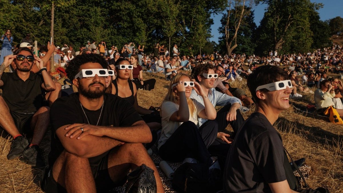 Greenwich Park, London, was full of people wearing special glasses to look up at the eclipse