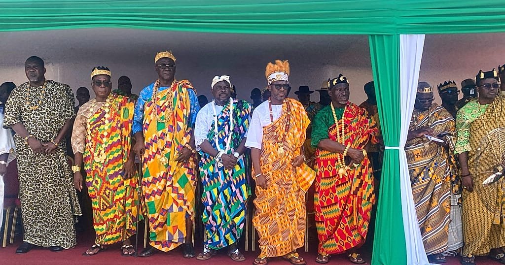 Ivorians line the streets of Abidjan to welcome the returned Djidji Ayokwe talking drum during the 66th Independence Day celebrations