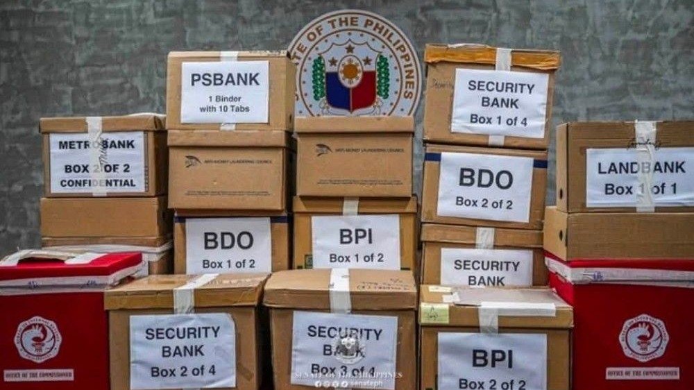 Boxes of subpoenaed financial records submitted to the Senate impeachment court