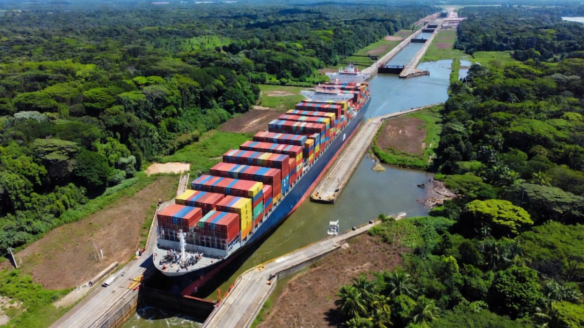 A container vessel transits the Panama Canal locks amid drought and El Nino water restrictions