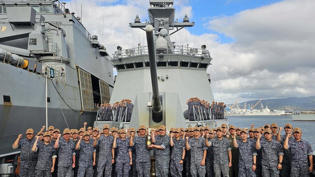 ROKS Daejeon crew members pose at Joint Base Pearl Harbor-Hickam after RIMPAC 2026