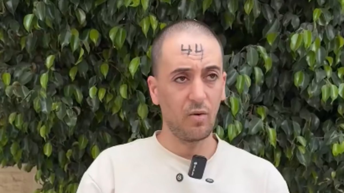 Palestinian detainee with number 44 written on his forehead during Israeli raid in Qabatiya, West Bank